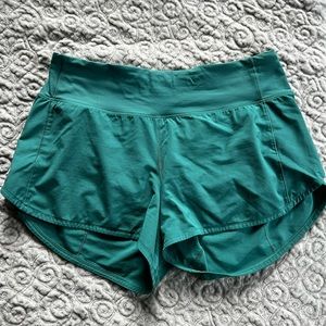 Lululemon Speed Up Mid Rise Short
4 inch seems - size 8